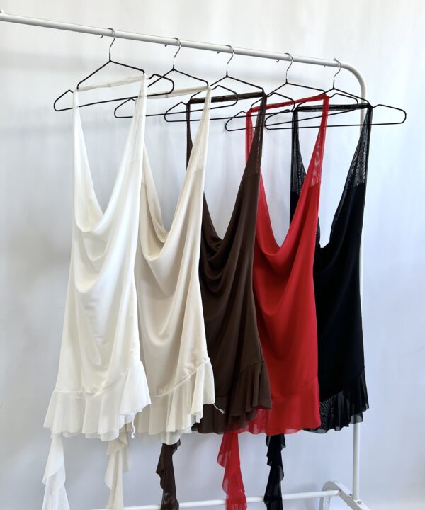 497/T-VESTIDO TUL LISO MARILYN BUCHE RECORTE IRREGULAR CON VOLADO CAIDO PICO