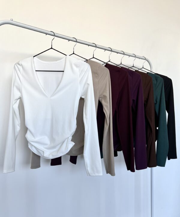 2369-REMERA MORLEY TAO ESCOTE V FORRADO MANGA LARGA CON ELASTICO LATERALES